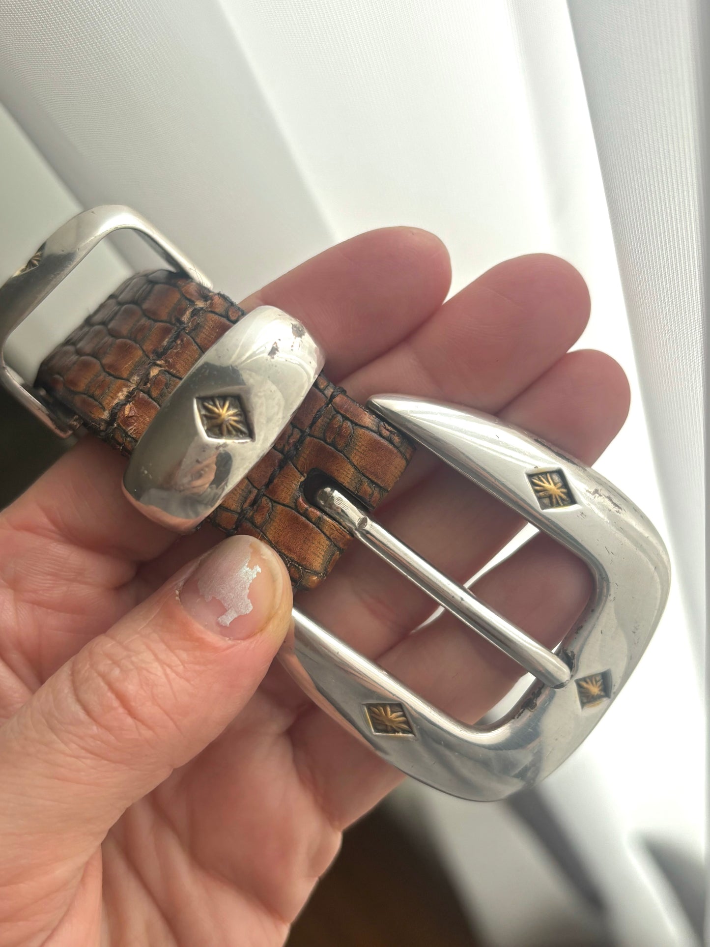 Brown embossed leather / silver tone buckle belt - 42