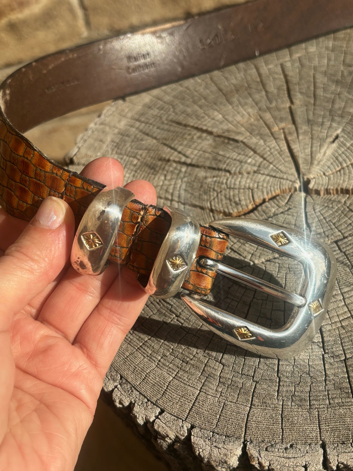 Brown embossed leather / silver tone buckle belt - 42