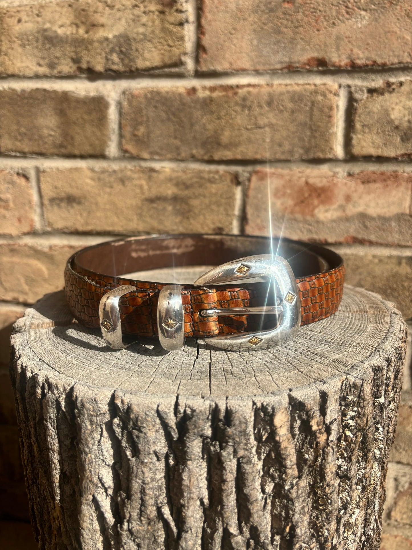 Brown embossed leather / silver tone buckle belt - 42