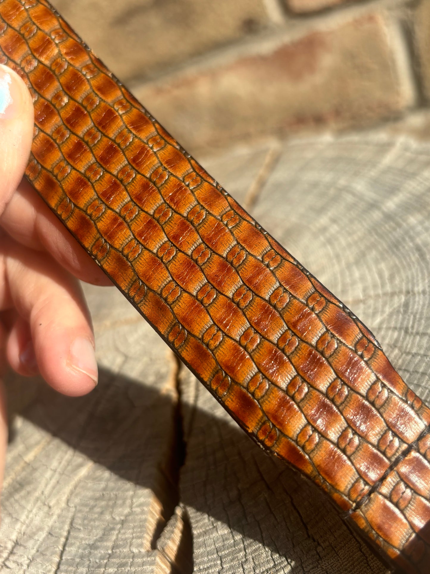 Brown embossed leather / silver tone buckle belt - 42