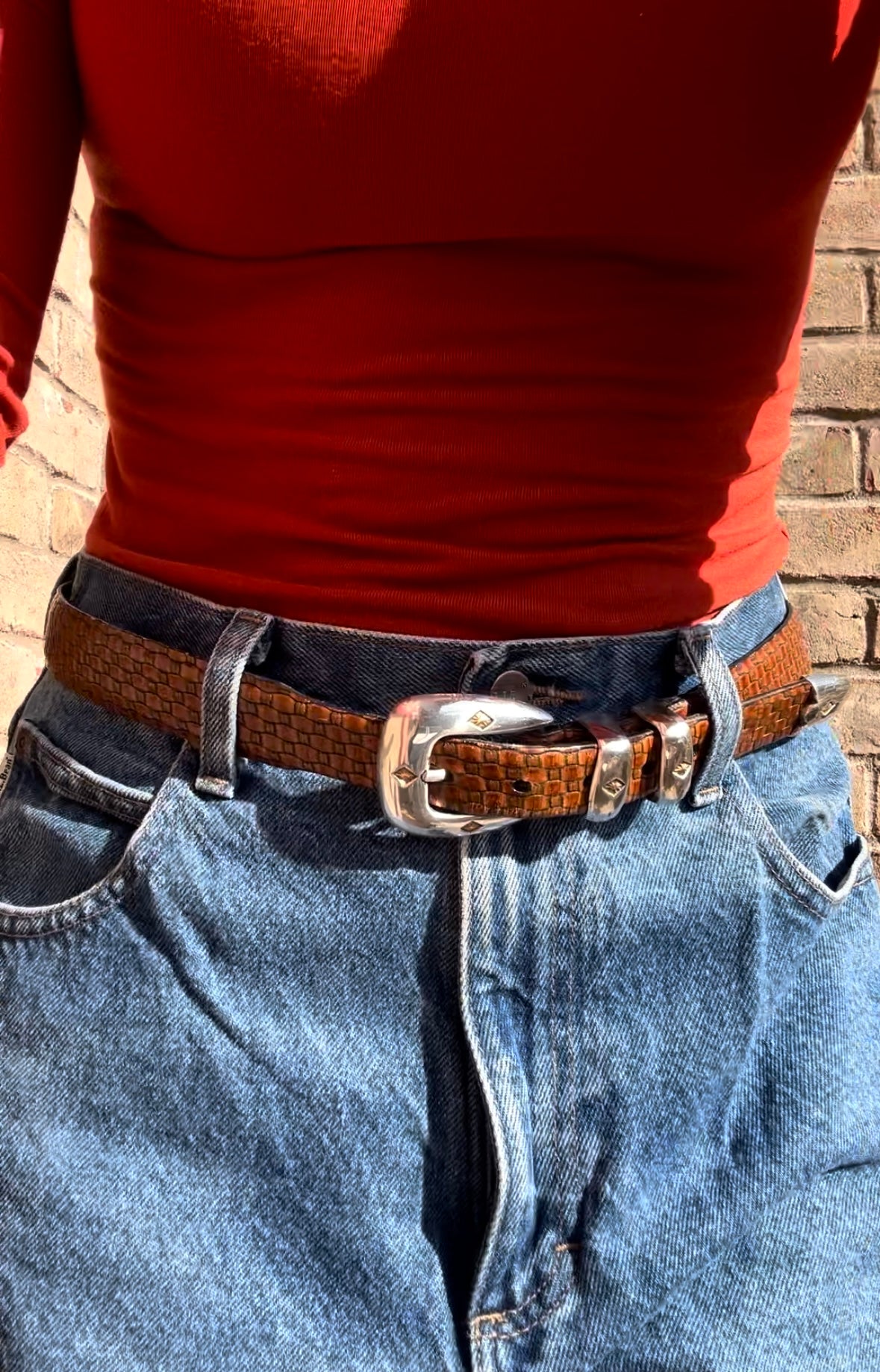 Brown embossed leather / silver tone buckle belt - 42